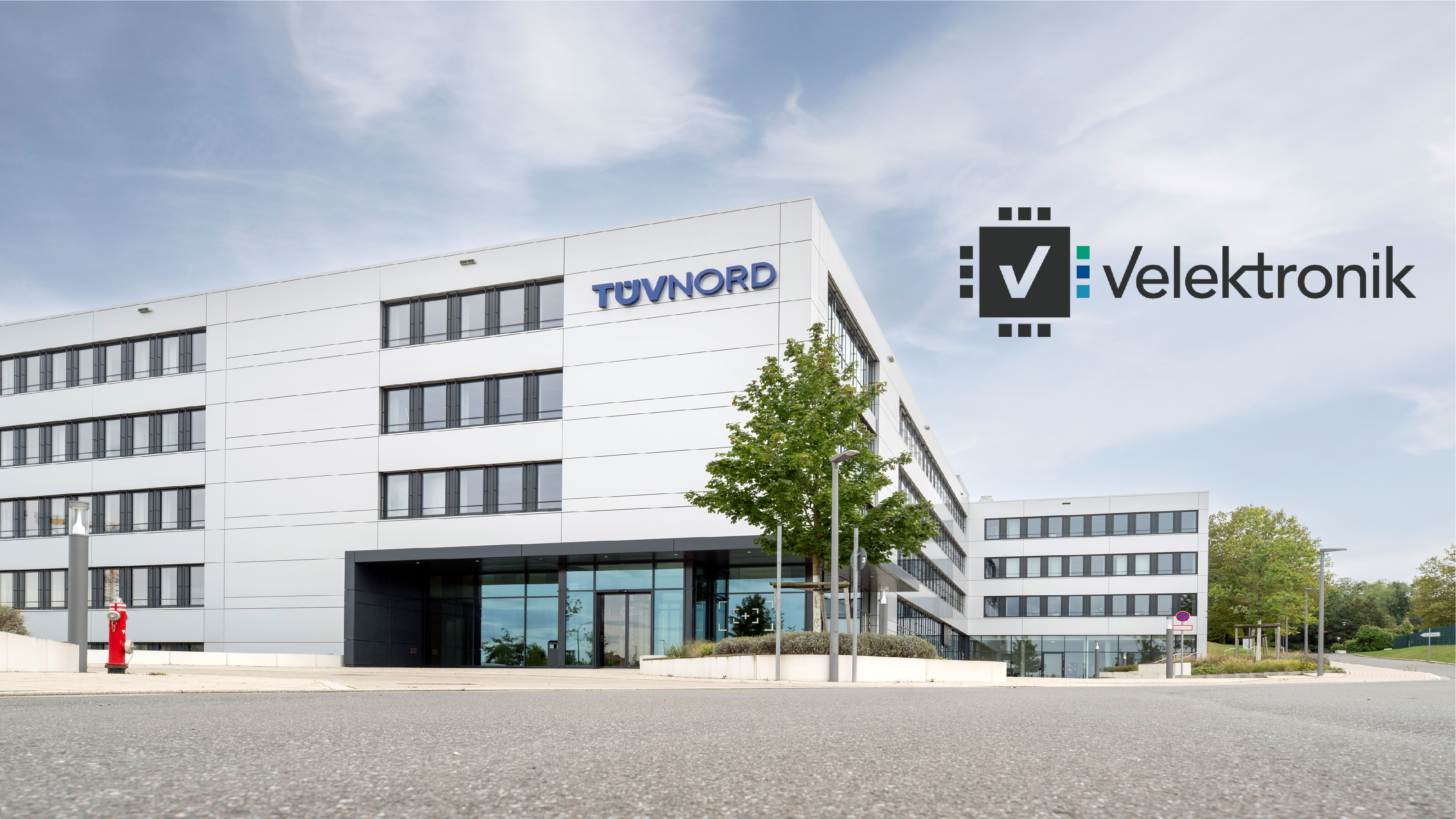 TÜV-Gebäude-ganz_mit-Logo